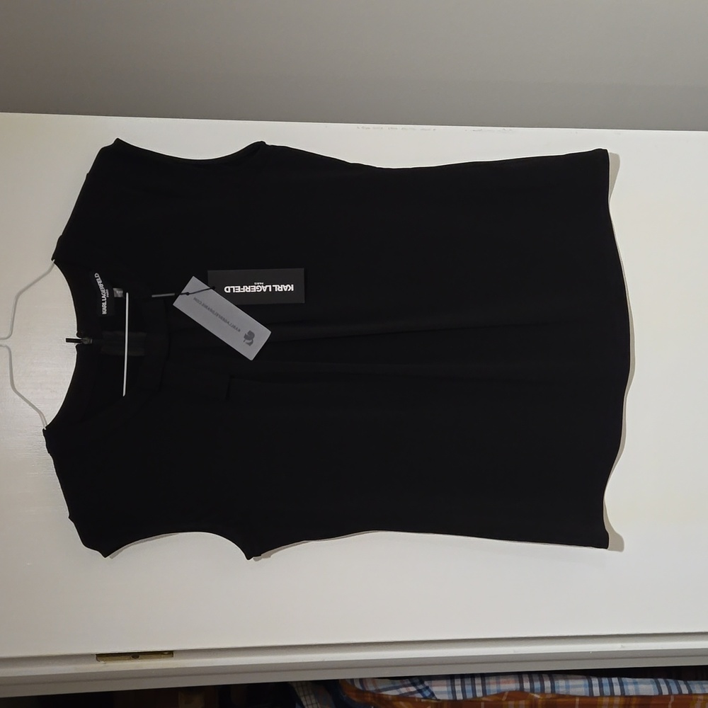 Womens size medium, black, sleeveless Karl Langerfeld top.